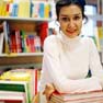 Photo - teacher sitting at desk