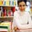 Photo - teacher sitting at desk